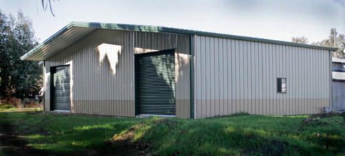 steel building garage with overhang.